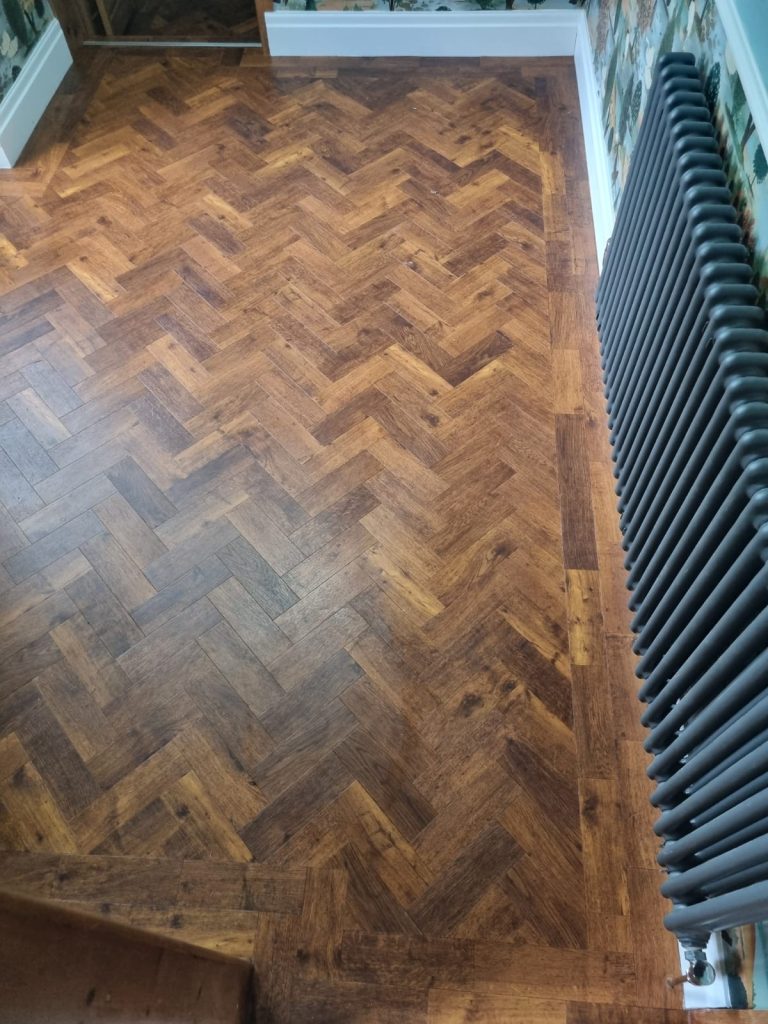 Dark_wood_LVT_herringbone